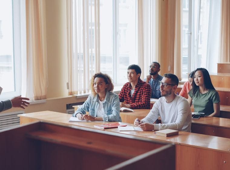 Instructor teaching a cohort of students